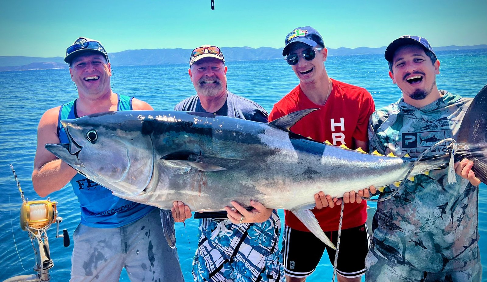 Osmijesi gostiju tokom big game fishinga